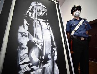 French court convicts 8 for stealing Banksy from Paris attack site