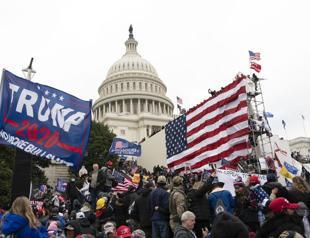 About half say Trump should be charged for 1/6: AP-NORC poll