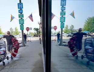 Parade shooting suspect bought 5 weapons despite threats