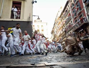 1st bull run in Pamplona in 3 years takes place; no gorings