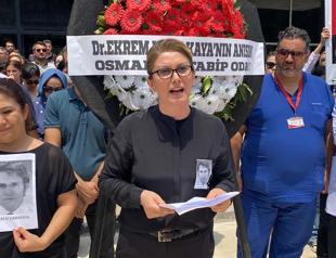 Healthcare workers walk out to protest killing of colleague