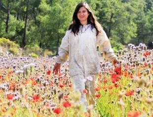 Woman quits her job, starts beekeeping in village