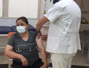 People run to hospitals for booster shots as cases rise