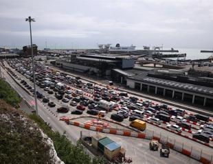 UK blames France as travelers face hours-long port delays