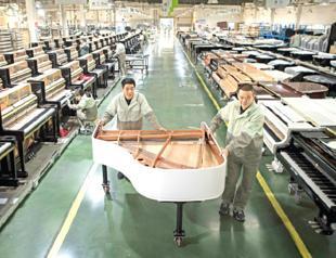 China’s factory activity weakens on soft demand