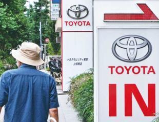 Toyota profit down as chips shortage keeps customers waiting