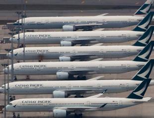 Cathay Pacific’s loss narrows in first half