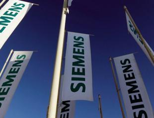 Siemens posts loss as energy spin-off struggles