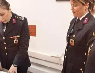 Country promotes first female general