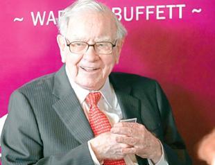 Buffett’s firm buys more Apple, Amazon while betting on oil