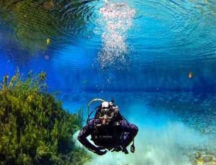 ‘Evil eye’ lake comes into vogue for divers