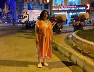 Woman stands still on sidewalk in Istanbul for 5 hours