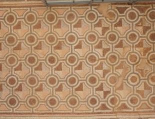 Ancient bath with mosaic restored