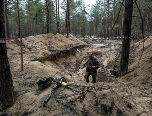 Ukrainian president: Mass grave found near recaptured city