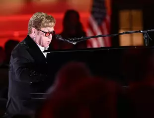 Elton John, a Trump favorite, sings at Biden White House