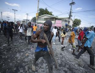 Haiti’s leader requests foreign armed forces to quell chaos