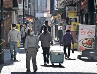 South Korea raises interest to tame inflation