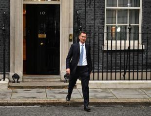 New UK finance minister tears up tottering PM’s agenda
