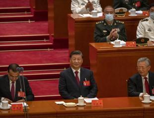 China’s Xi calls for military growth as party congress opens