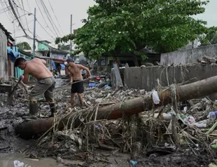 Philippines storm death toll jumps to near 100