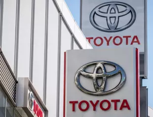 Toyota keeps net profit forecast despite production woes