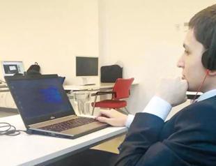 Visually impaired Turkish man works at Amazon