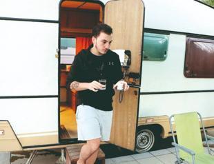 Student starts living in caravan as house rents soar