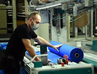 Industrial production rose slightly