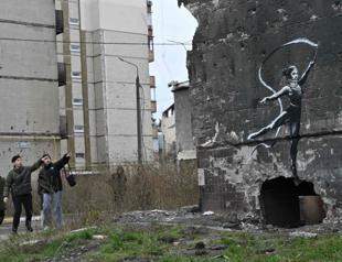 Banksy unveils Ukraine mural in town bombed by Russia