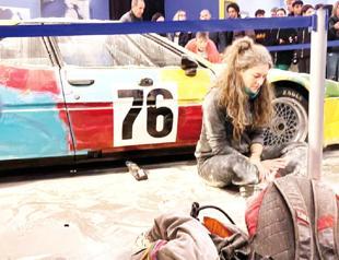 Climate activists cover Andy Warhol work with flour in Milan