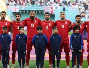 As protests rage in Iran, team fall silent for anthem at World Cup