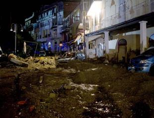 Rescuers search for missing after landslide on Italian island kills one
