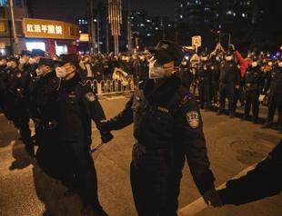 Police detain two people at Shanghai protest site: AFP