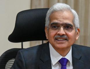 India hikes interest rate but at slower pace