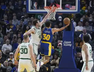 Warriors cool off red-hot Celtics