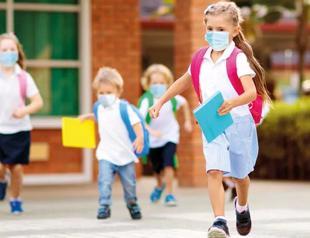 Schools warn parents for children to wear face masks
