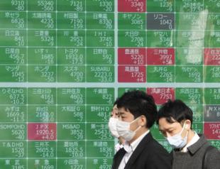 Tokyo shares close higher