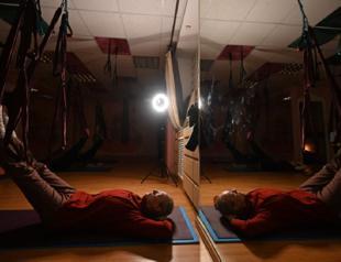 Ukraine’s yogis breathe through wartime blackouts