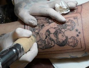 More than skin deep: Fans line up for Messi tattoos