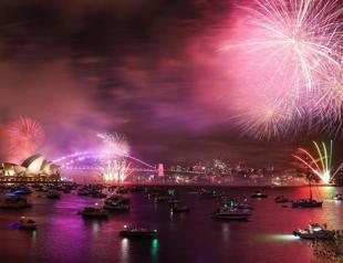 Revelers throng to New Years parties after COVID hiatus