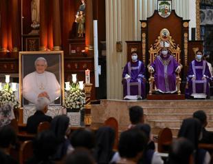 Pope Francis leads final farewell to Benedict before thousands