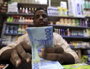 Sudanese tighten belts as economic crisis grinds on