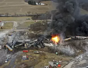 US cargo train derails, causing huge fire