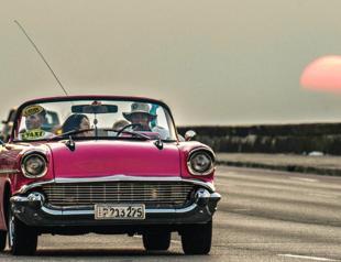 Cuba puts state-owned car owners on commuter aid duty
