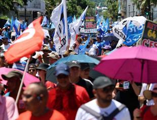 French protesters hold more strikes over pension changes