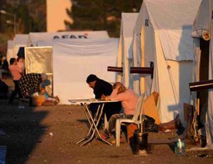 Quake victims sleep in trains, tents, greenhouses