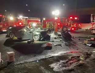Tesla driver killed after plowing into firetruck on freeway