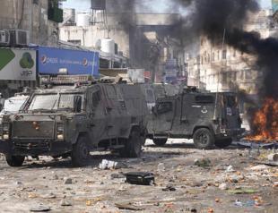 Violence flares around Gaza after deadly Israeli raid in West Bank