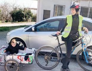 Cyclist student handing out ‘hope’ in quake zone