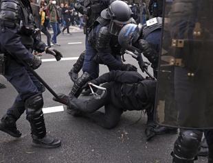 Rights groups accuse French police of brutality in pension protests
